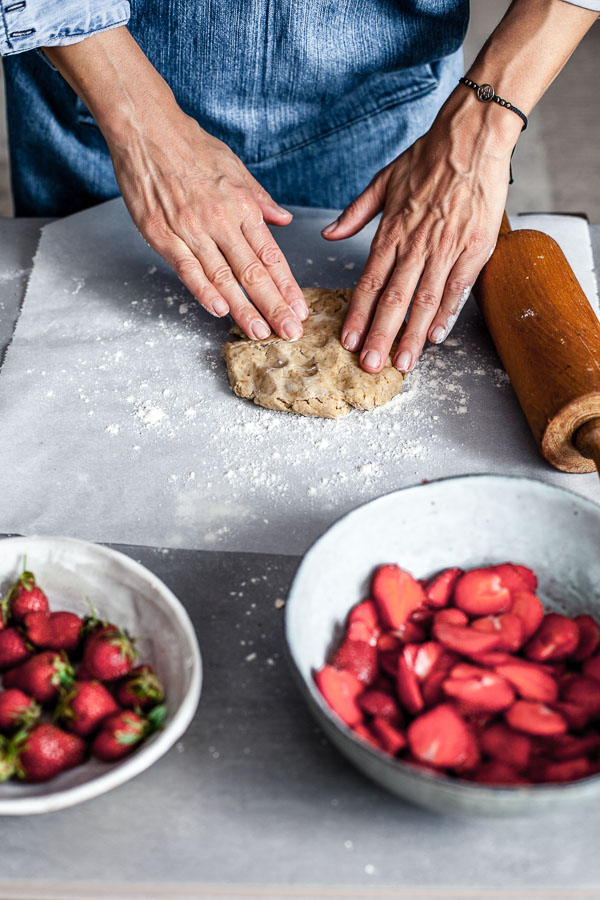 Making of strawberry galette, flattening the dough, Maja brekalo