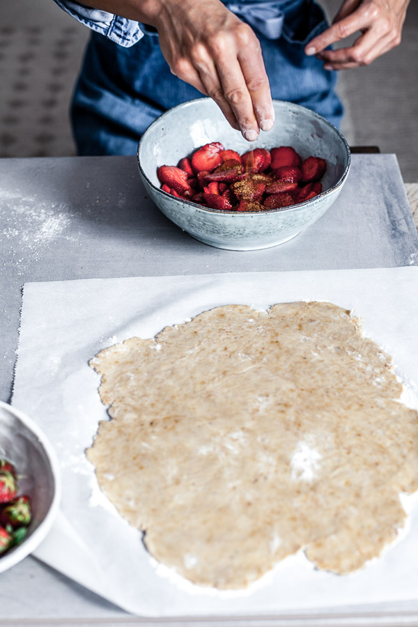 Making of strawberry galette, seasoning strawberries with coconut sugar, Maja Brekalo